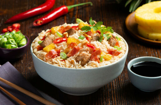 Fried rice bowl with pineapple and salami