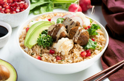 Power bowl with fried rice, falafel, tahini sauce, an avocado and soy sauce