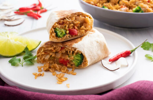 Rice filling with broccoli and red peppers wrapped in a tortilla