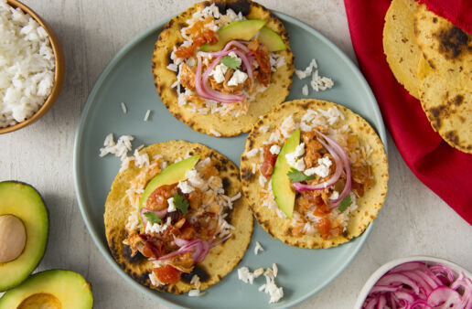 Tacos filled with chicken tinga and rice