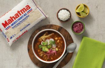 Traditional-Mexican-Red-Pozole-with-White-Rice-Avocado-Pork-Pickled-Onions-and-Radishes